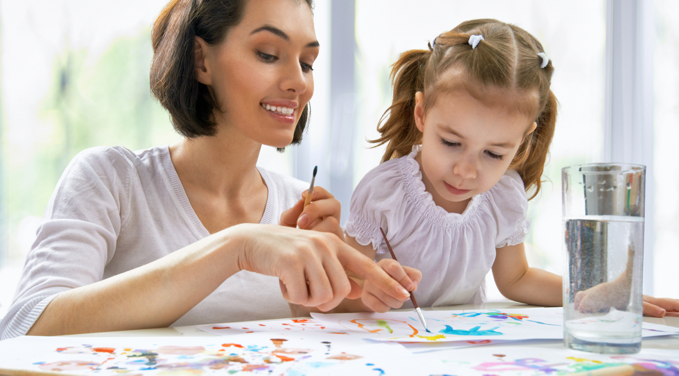Woman Painting With Child