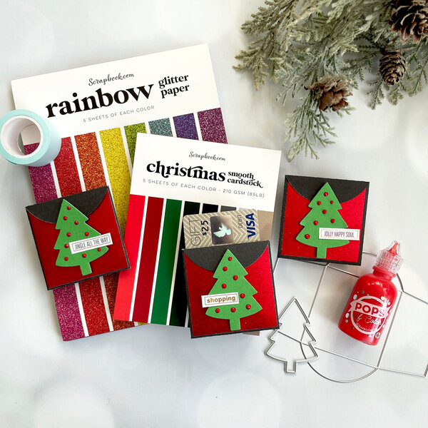 https://www.scrapbook.com/gallery/cache/44/442363/01_easy-diy-gift-card-holder_scrapbookcom-rainbow-glitter-christmas-a2-pops-color-rudolph-red-nested-fir-tree-die-mini-envelopes_2.jpg