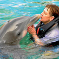 Me kissing a dolphin in Bermuda